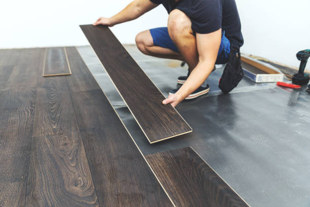 Dark laminate floor installation in Washington home office